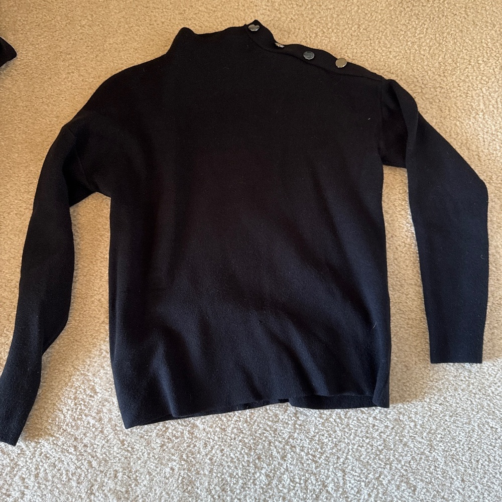 Black Tahiti pull over sweater with buttons on one top